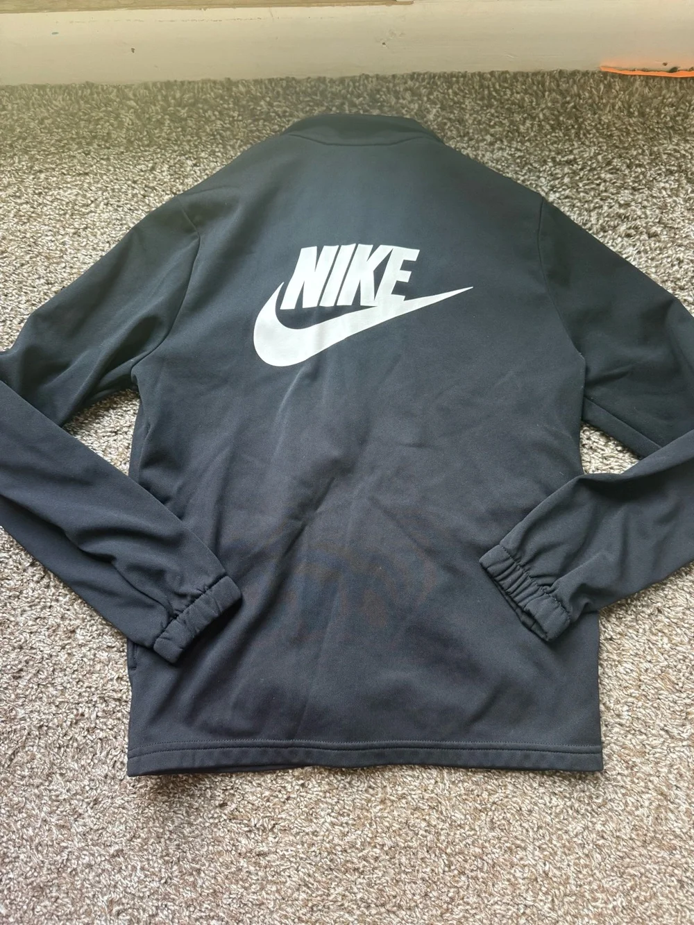 Nike Black Jacket with White Swoosh Tag